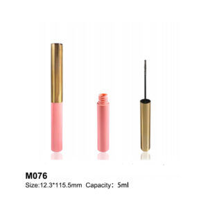 round golden pink mascara bottle