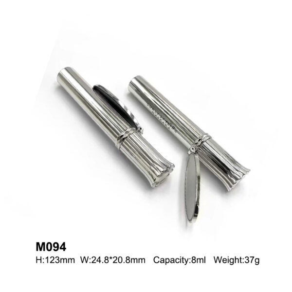 round silver mascara bottle with a mirror