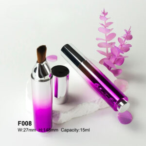 round gradient purple foundation bottle with brush