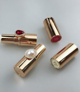 golden lipstick tube with detachable ring