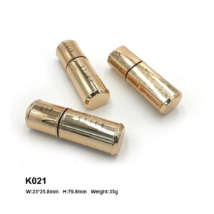 round golden lipstick container
