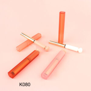 round slim orange lipstick tube