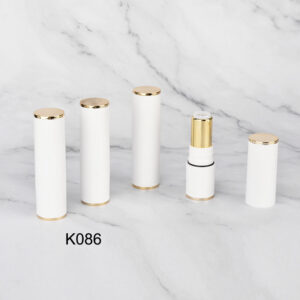 round white golden lipstick tube