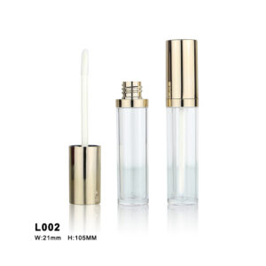 cylindrical golden transparent lip gloss tube