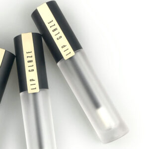 round black golden cap lip gloss container