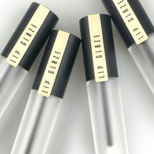 round black golden cap lip gloss container