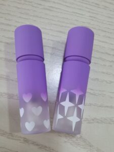 round frosted purple lip gloss tube with custom print