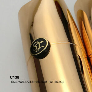 triangular golden lipstick container